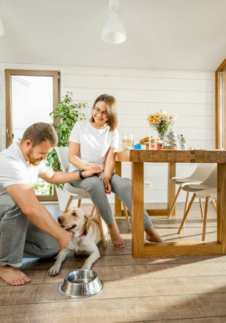 Young couple with dog at home | Floor to Ceiling Virginia